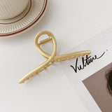 Hollow metal hair claw