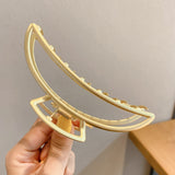 Hollow metal hair claw