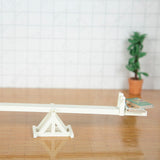 Doll house seesaw