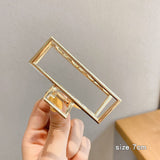 Hollow metal hair claw