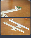 Doll house seesaw