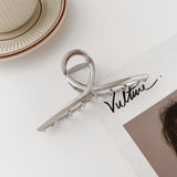 Hollow metal hair claw