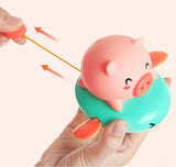 Bathroom toy playing piggy