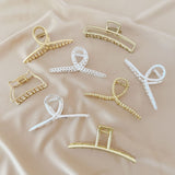 Hollow metal hair claw