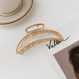 Hollow metal hair claw